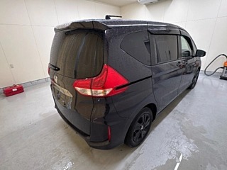 Honda Freed GB5 Black Style 2023, лот, сзади 3/4