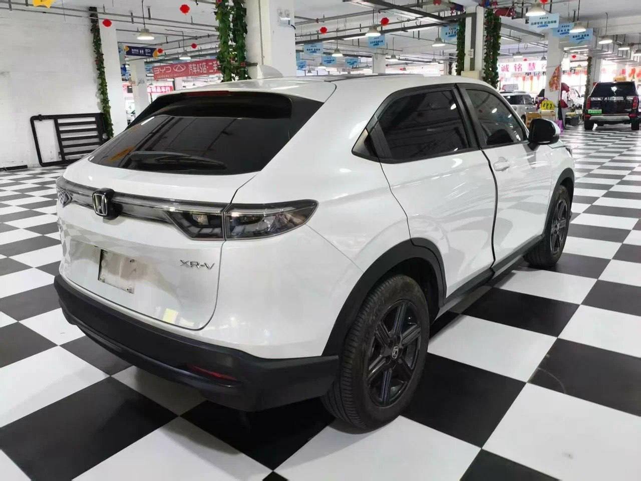 Honda XR-V Trend 2023, лот, вид сзади 3/4 справа